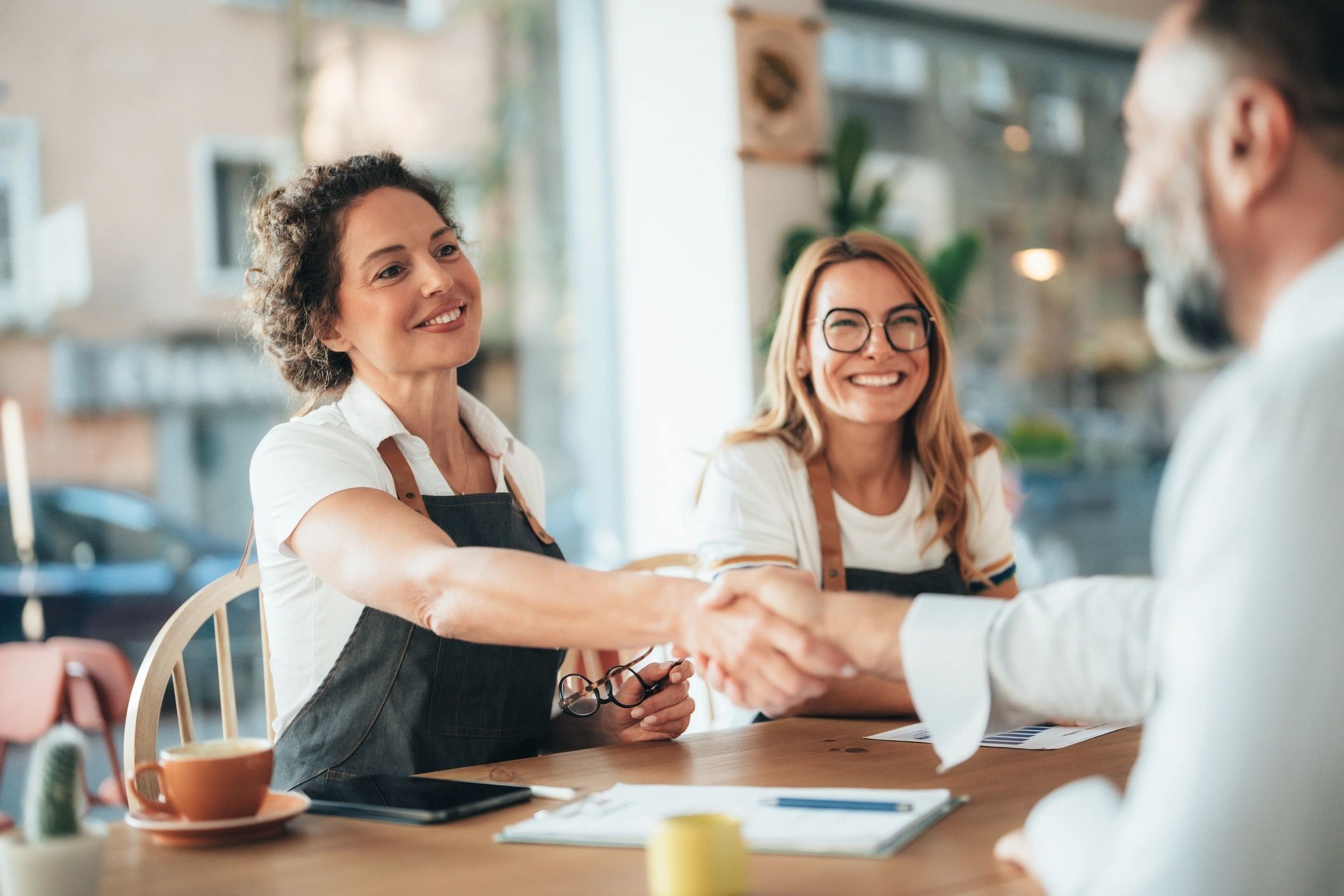 Ascend Acquisitions team meeting with a client